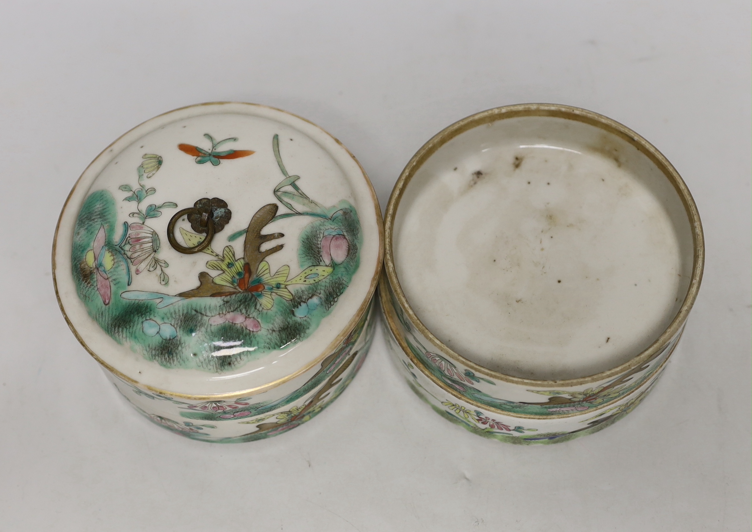 An early 20th century Chinese enamelled porcelain four section stacking food container and cover, 14cm